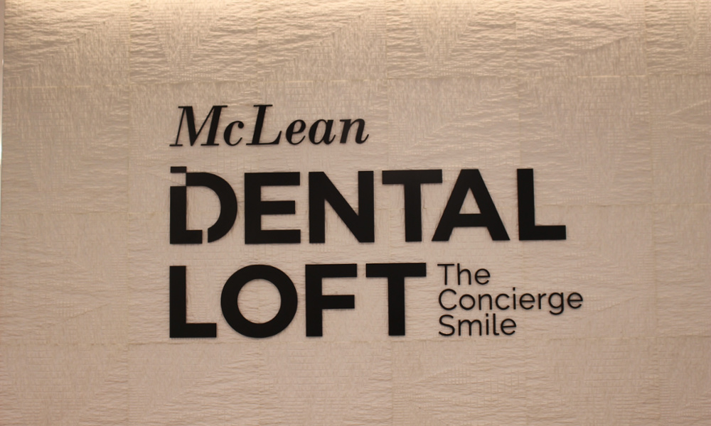 McLean Dental Loft logo displayed in the reception area